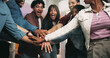 © Wess/peopleimages.com - Friends, home and hand stack for happy reunion, social gathering or celebration party for person success. Excited achievement or group of people together for support, winning or good news for bonding