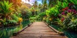 © Kitiphong - wooden dock in tropical forest with exotic plants and colorful flowers