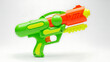 © Anwari - Brightly Colored Toy Water Gun on a White Background for Summer Fun
