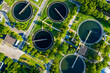 © Yic Ma/Stocksy - circular sedimentation tanks in wastewater treatment plant