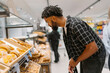 © Mattia/Stocksy - Exploring Fresh Baked Goods in indoor Market