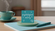 © anees - Blue sticky note on a notebook reads psychological safety with small heart drawings. Beside is a teal pen and coffee cup. Concept for workplace wellbeing mental health. Workplace Well-being & Organiza