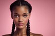© Surachetsh - A confident young black woman poses under soft studio lights that highlight her flawless skin and expressive eyes, a modern sense of beauty with calm, elegant charm.