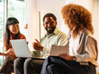 © Aleksandra Jankovic/Stocksy - Diverse Team Sharing Ideas In A Modern Office During A Friendly Chat