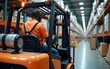 © Landon - Black worker operating forklift truck at factory. High quality