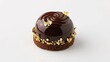 © Krishno - Decadent chocolate egg dessert with gold leaf isolated on white background
