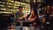© stockbusters - Loving pair talking bar enjoy cozy romantic atmosphere. Smiling romantic couple