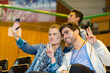 © auremar - sport supporters at stadium doing a selfie