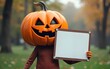 © Carol - Pumpkin head character holding blank sign. High quality