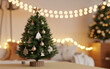 © RAKIB - Cozy christmas tree with warm lights and festive ornaments