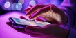 © Love 4 YOU - Woman using modern smartphone with colorful neon lights in background