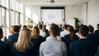 © Wool World - Business conference presentation with audience in modern meeting room.