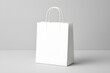 © melano - Clean white shopping bag mockup for branding and promotion projects, a versatile asset for showcasing designs and retail concepts with elegance