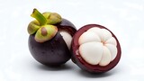 Exotic Queen of Fruits: A Ripe Mangosteen Whole and Halved Revealing Its Lush White Pulp.