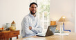 © OnPoint/peopleimages.com - Arms crossed, laptop and portrait of business man in home office for online planning or research. Computer, remote work and smile of happy freelance employee at desk in apartment for startup career