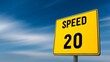© suyu - Yellow speed warning sign with clear copy space on a bright sky backdrop, featuring a bold 20 limit symbol, road caution elements, safety message and traffic guidance in a clean minimal background