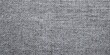 © YOUR - Coarse woven fabric texture displays a neutral gray surface detail