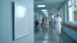 © liliyabatyrova - Nurses and medical staff are seen moving purposefully through a bright hospital corridor. The atmosphere is bustling with activity and the focus on patient care is evident