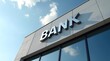 © PrettyStock - Bank Building Facade with Sign against Blue Sky and Clouds
