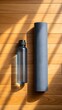 © NoorArt Studio - Yoga mat and water bottle on wooden floor with light