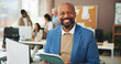 © SiphosethuFan/peopleimages.com - Media agency, portrait and happy man in office, tablet and magazine editor with publication. Mature person, smile and journalist with tech, career ambition and submission with creative project or app