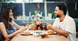 © peopleimages.com - Bonding, dating and eating with happy couple at table of restaurant together for romance. Conversation, love or relationship and smile of people with food for anniversary, celebration or hospitality