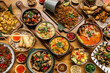 © TravelPhotography - many different thai food dishes on table in modern restaurant in bangkok thailand