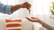 © Sabbir - Handing over house keys to a new homeowner or tenant