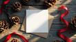 © Designbrisa - Blank Greeting Card Mockup with Pinecones, Kraft Envelope, and Red Ribbon on Wooden Background