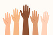 © Cincailet - Hands Raised in Unity: A diverse ensemble of hands, each bearing unique skin tones, reach upwards in a gesture of solidarity, cooperation, and shared ambition.
