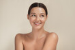 © Buyanskyy Production - Smiling Woman With Natural Glowing Skin Looking Away In Beauty Shot