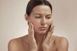 © Buyanskyy Production - Frustrated Woman Touching Dry Skin On Face Showing Skincare Problem