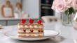© pvl0707 - Mille feuille cake with heart shaped maraschino cherries on a pastel pink table with roses for a sweet Valentine's Day celebration