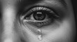 © CreativeIMGIdeas - The powerful close-up portrait of a solitary eye, with a glistening tear cascading down the cheek, capturing raw emotion.