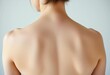 © DITSARAPHAN - Smooth, pale skin of a bare back; delicate spine visible,  lighting,  resource
