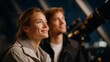 © Tania - A couple visiting a public observatory during an open night event, looking through a telescope while a guide explains constellations — educational astronomy experience, night-sky tourism, and