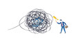 © Anik - Businessman trying to solve a complex problem represented by a tangled mess