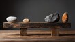 © backup_studio - Four different shaped and colored stones on a wooden plank representing balance and stability. Natural elements and harmony concept.
