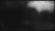 © MuhammadQammar - Distressed Black and White Texture with Scratches, Smudges, and Light Leaks