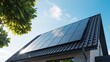 © Kamranazhar - Modern house roof with large solar panel array in bright natural daylight