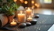 © Vadym - Photo of yoga mat with candles stones and plants creates tranquil scene. Light from burning candles enhances zen space. Relaxation wellness atmosphere is present in this image.