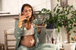 © milanmarkovic78 - Pregnant Woman Eating Sweets And Enjoying It