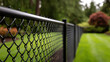 © Keopaserth - New black chain link fence black fence chain link metal fence outdoor fence yard fence garden fence newly built residential fence