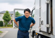 © tsuyoi_usagi - Japanese Delivery Driver Suffering from Back Pain Beside Truck
