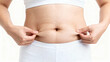 © 11 - Close-Up of Female Abdomen with Skin Stretching and Texture in Natural Light