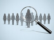 © MuhammadFarooq - Magnifying glass focuses on one person silhouette from the group. Symbol of talent search employee recruitment. Concept of selection finding the best candidate for the job. Human Resources / Recruitme