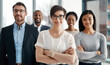 © Donson2000/peopleimages.com - Happy, woman and leader with arms crossed at office for teamwork, collaboration and about us. People, employee and boss or team manager with smile on portrait for diversity, progress and confident