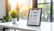 © Alpha - Minimal workspace with clipboard checklist, potted plant, and sunlight through large windows.