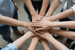 © Creuxnoir - Group of people hands together