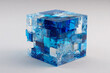 © Tohamina - abstract cube made of many translucent blue and white cubes with water texture
